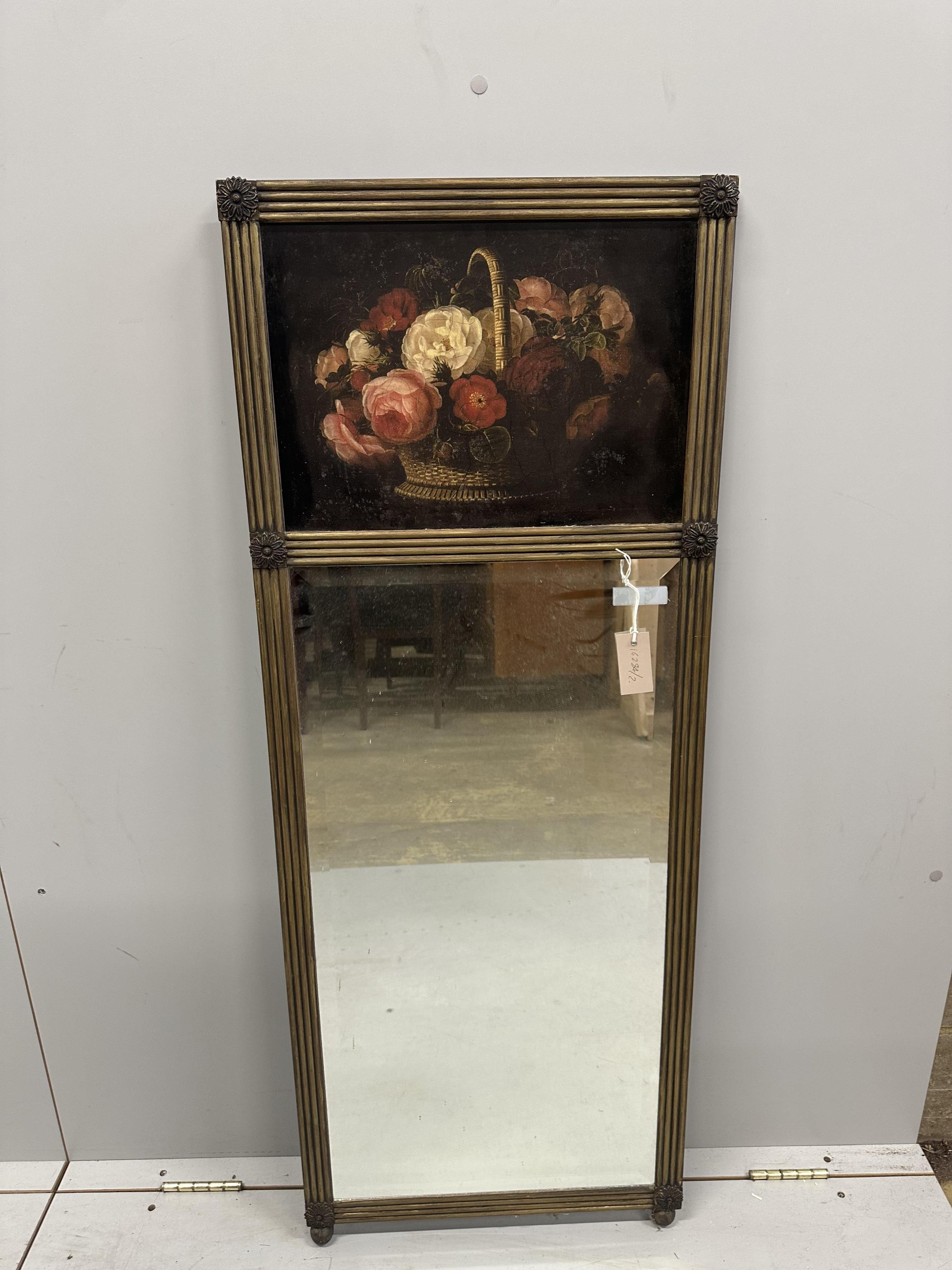 An 18th century style gilt framed trumeau mirror painted with a basket of flowers, width 48cm, height 125cm. Condition - fair